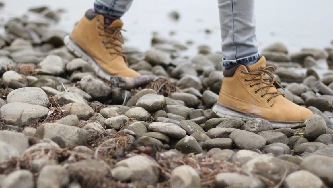 boots on a rocky beach